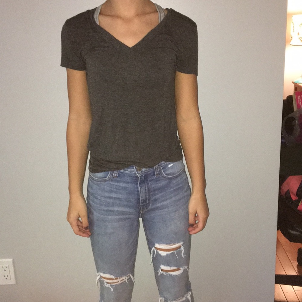 Grey V-neck.